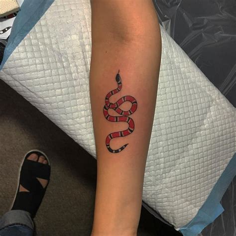 small gucci snake tattoo